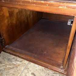 Miriam's Furniture Consignment Shop - Rolling coffee table with pass-through cabinets