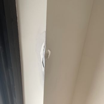 Flooring Removal Services - As they were taking out their floor sanding machine they plowed into wall. - Flooring Near Me - Pompano Beach, Florida