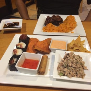 Guahan Grill - In the front is the sampler platter and in the background is the chomorro deep fried ribs. - Barbeque Near Me - Oceanside, California