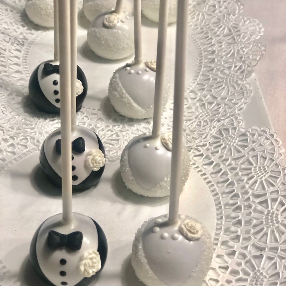 Tiffany's Cake Poppery - Bride and Groom Cake Pops for my wedding. As delicious and they are beautiful! - Bakeries Near Me Tiffany's Cake Poppery - Bride and Groom Cake Pops for my wedding. As delicious and they are beautiful! - Bakeries Near Me