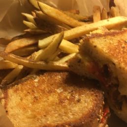 a grilled cheese sandwich and french fries a grilled cheese sandwich and french fries