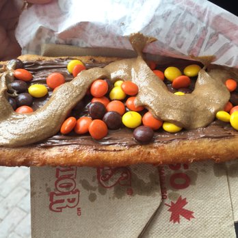 BeaverTails Niagara Falls - The Triple Tip - Hazelnut spread with Reese's Pieces and peanut butter - Desserts Near Me - Niagara Falls, Ontario