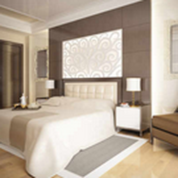 Airel Construction - a bedroom with a bed and a chair - General Contractors Near Me Airel Construction - a bedroom with a bed and a chair - General Contractors Near Me