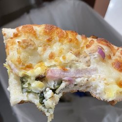 Marco's Pizza - Not the surprise you hope for after eating most of a slice of pizza... Cockroach cooked into pizza