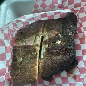 Red Lion BBQ - The ribs were really dry. They've been sitting for a while for sure. You can see the black burnt parts. I couldn't even chew super hard. - Barbeque Near Me - Stuart, Florida