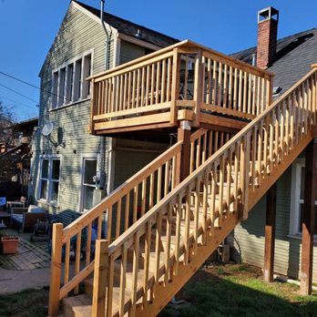 RiverCross Construction - New cedar deck with french door off of master. - General Contractors Near Me - Eagle Point, Oregon
