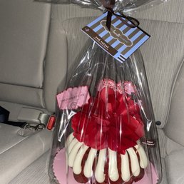 a bundt cake wrapped in plastic a bundt cake wrapped in plastic