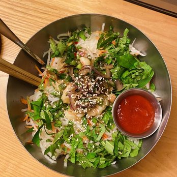 Bistro BT - a bowl of asian food with chopsticks - Vietnamese Near Me - Tampa, Florida