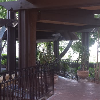 Orange Hill Restaurant & Events - Walkway to entrance over a koi pond - Steakhouses Near Me - Orange, California