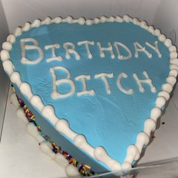 a heart shaped birthday cake