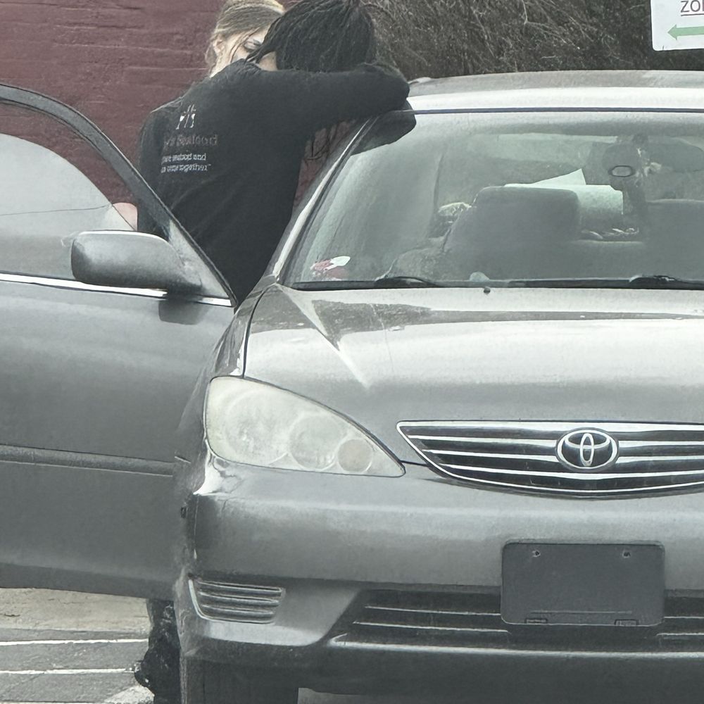 This is the guy feeding his dog. This is the guy feeding his dog.