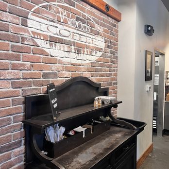 Woods Coffee - a brick wall in a coffee shop - Coffee & Tea Near Me - Bellingham, Washington Woods Coffee - a brick wall in a coffee shop - Coffee & Tea Near Me - Bellingham, Washington