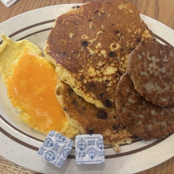 Seminole Diner - Super six combo with chocolate chip pancakes, sausage, & scrambled eggs with cheddar - Breakfast & Brunch Near Me - Seminole, Florida