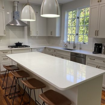 Prime Custom - a kitchen with a large island - General Contractors Near Me - Sterling, Virginia