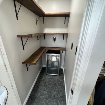 Scheidler Solutions - This is the pantry complete after we drywalled, installed tile, painted, tiled, built and installed shelves. - Handyman Near Me