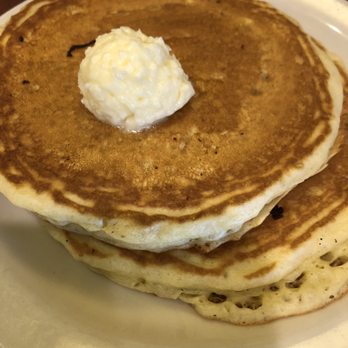Bakers Square - a stack of pancakes with butter on top - American Near Me - Mentor, Ohio