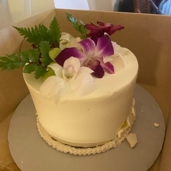 Maui Wedding Cakes - Custom made 6" white cake passion fruit filling cake with buttercream frosting and fresh orchids and greenery decor - Bakeries Near Me - Kihei, Hawaii Maui Wedding Cakes - Custom made 6" white cake passion fruit filling cake with buttercream frosting and fresh orchids and greenery decor - Bakeries Near Me - Kihei, Hawaii