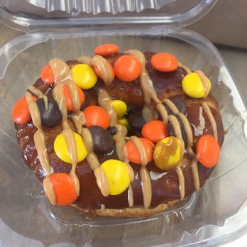 Doughology - Babylon - Vanilla donut with cinnamon cream, maple, Reese's pieces and peanut butter sauce - Donuts Near Me - Babylon, New York Doughology - Babylon - Vanilla donut with cinnamon cream, maple, Reese's pieces and peanut butter sauce - Donuts Near Me - Babylon, New York