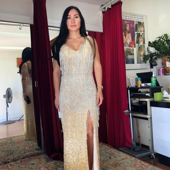 Babe Cleaners & Tailor - The bottom of the dress was hemmed because it was way too long and dragging on the floor. - Sewing & Alterations Near Me - Anaheim, California Babe Cleaners & Tailor - The bottom of the dress was hemmed because it was way too long and dragging on the floor. - Sewing & Alterations Near Me - Anaheim, California