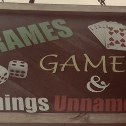 Frames Games & Things Unnamed - Storefront sign from upstairs