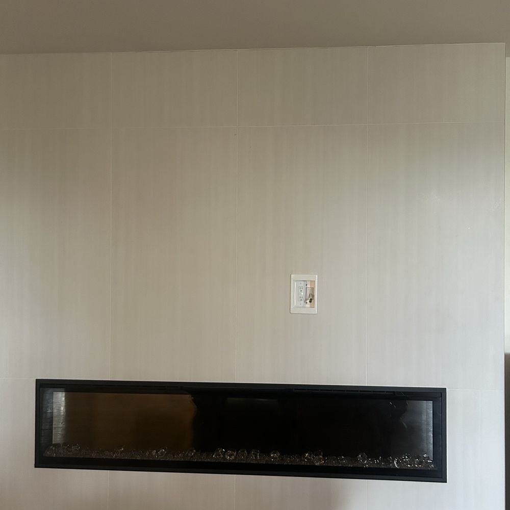 AR Electric - View of electrical outlet and how it looked above the fireplace. He did an excellent job! - Electricians Near Me - Covina, California AR Electric - View of electrical outlet and how it looked above the fireplace. He did an excellent job! - Electricians Near Me - Covina, California