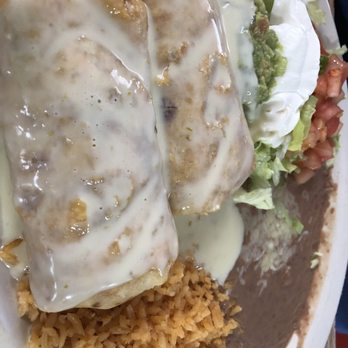 Los Cuates Mexican Restaurant - Chicken Chimichanga with beans and rice plate! - Mexican Near Me - Indianapolis, Indiana Los Cuates Mexican Restaurant - Chicken Chimichanga with beans and rice plate! - Mexican Near Me - Indianapolis, Indiana