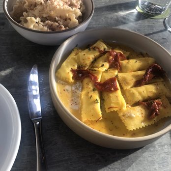 Lilia - Mafaldini, Pink Peppercorn, Parmigiano & Sheeps Milk Cheese Filled Agnolotti, Saffron, Dried Tomato, Honey - Italian Near Me - Brooklyn, New York