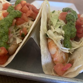 Bad Bean Baja Grill - Mahi-mahi fish taco and green tail shrimp taco with chimichurri sauce. - Mexican Near Me - Kitty Hawk, North Carolina Bad Bean Baja Grill - Mahi-mahi fish taco and green tail shrimp taco with chimichurri sauce. - Mexican Near Me - Kitty Hawk, North Carolina