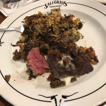 Saltgrass Steak House - Smothered steak with brussel sprouts - Steakhouses Near Me - Rockwall, Texas Saltgrass Steak House - Smothered steak with brussel sprouts - Steakhouses Near Me - Rockwall, Texas