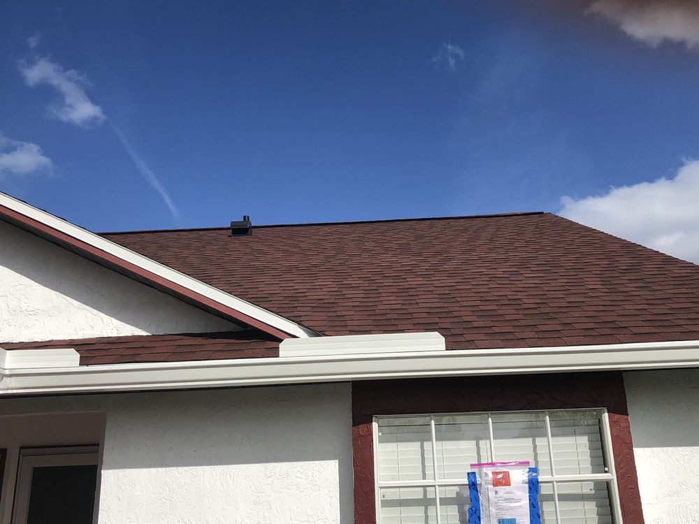 Slide of Tadlock Roofing