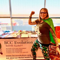 BCC Evolution - BCC Evolution event table. Kelli as a superhero.