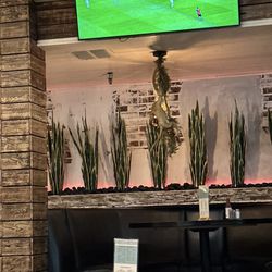 El Chango Borracho - Inside decor and TV's surround the entire restaurant.