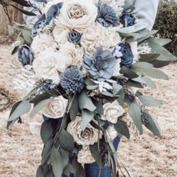 Melanie re-created this bouquet. We had to add the blue flowers, as they do not grow this color naturally. ;) It was absolutely GORGEOUS!!