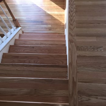 Sam's Hardwood Floors - a view of the stairs leading up to the second floor - Flooring Near Me Sam's Hardwood Floors - a view of the stairs leading up to the second floor - Flooring Near Me