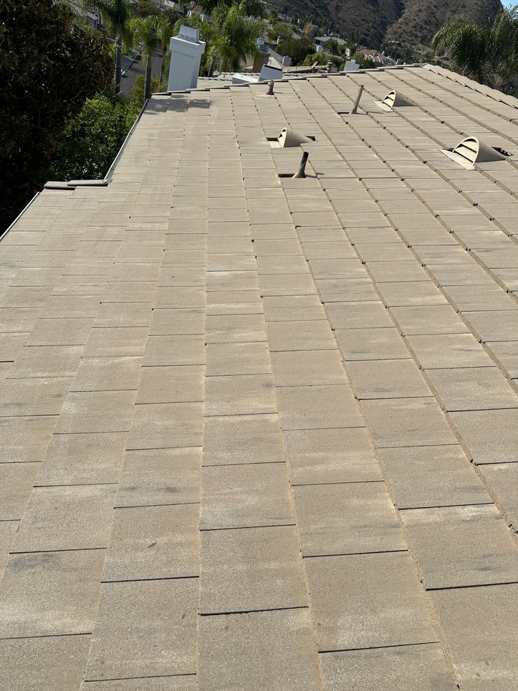 Slide of Aloha Bros Roof Cleaning