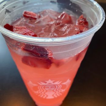 Starbucks - a drink in a plastic cup on a table - Coffee & Tea Near Me - Dublin, California Starbucks - a drink in a plastic cup on a table - Coffee & Tea Near Me - Dublin, California