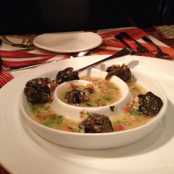 Kilauea Lodge - Escargots, $13.50. Sautéed in butter with garlic, shallots, mushrooms and bell peppers. Finished with brandy and white wine. - Hotels Near Me - Volcano, Hawaii Kilauea Lodge - Escargots, $13.50. Sautéed in butter with garlic, shallots, mushrooms and bell peppers. Finished with brandy and white wine. - Hotels Near Me - Volcano, Hawaii