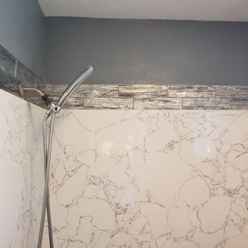 Luxehome Construction - Glass tile at top of quartz shower walls. - General Contractors Near Me - Rancho Cordova, California
