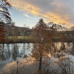Shenandoah River Cabins - View from deck: water's edge over grown beyond use for fishing.