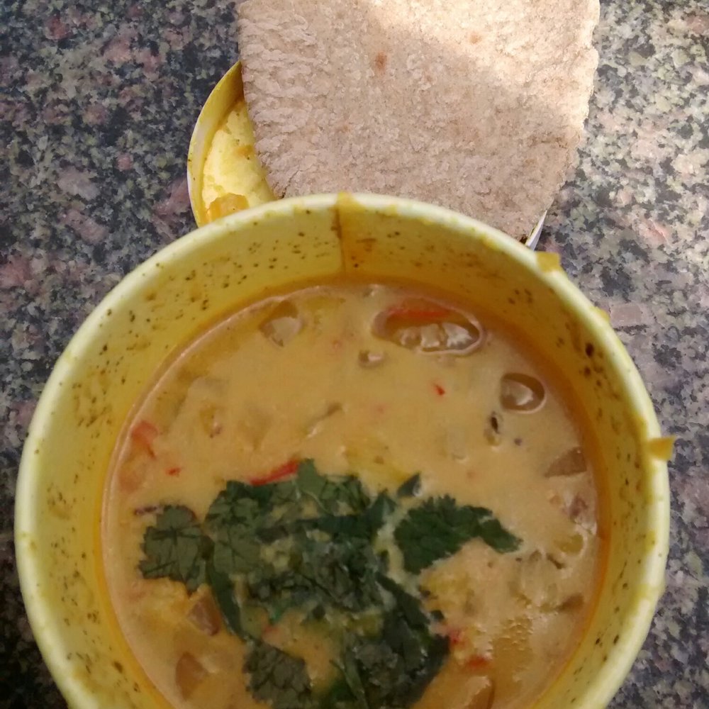 Coconut & rice spicy broth & pitta bread
