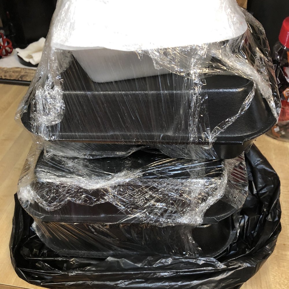 Curbside BBQ & Seafood - The delivery stack uncovered. Plastic wrap holds everything in place. - Seafood Near Me - Tallahassee, Florida Curbside BBQ & Seafood - The delivery stack uncovered. Plastic wrap holds everything in place. - Seafood Near Me - Tallahassee, Florida