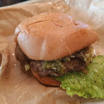 Hen & Heifer - The Creaminal: Ground beef patty, Cream Cheese, Jalapeños, Lettuce, Tomato, Pickles, and Jalapeño Dressing - American Near Me - Pomona, California