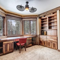 Cabinets by Sun Ray - A striking walnut office designed by Cabinets by Sun Ray.   General Contractor: Jirsa Construction