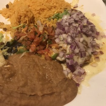 Tequila Bar & Grill - Enchilada buried under a mountain of onion with rice and beans - Mexican Near Me - Round Rock, Texas Tequila Bar & Grill - Enchilada buried under a mountain of onion with rice and beans - Mexican Near Me - Round Rock, Texas