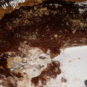 Sugar Momma's - a chocolate pie with a slice taken out of it - Candy Stores Near Me - Hermann, Missouri Sugar Momma's - a chocolate pie with a slice taken out of it - Candy Stores Near Me - Hermann, Missouri