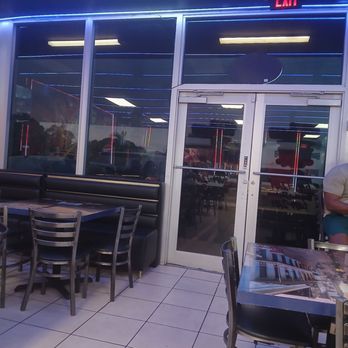 Sabor Dominicano Restaurant - Front door with the dark window tints I told you about in my review - Dominican Near Me - Miramar, Florida