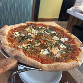 Kitchen Ten Eleven - Margherita pizza, thin and crispy crust. - New American Near Me - La Quinta, California Kitchen Ten Eleven - Margherita pizza, thin and crispy crust. - New American Near Me - La Quinta, California