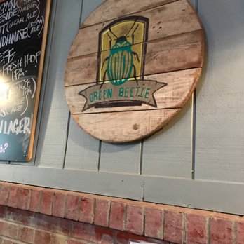 The Green Beetle - The Green Beetle sign on the wall - American Near Me - Memphis, Tennessee The Green Beetle - The Green Beetle sign on the wall - American Near Me - Memphis, Tennessee