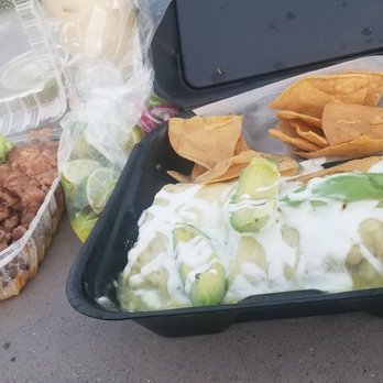 Takos - Pictured here is an order of carne asada fries & a wet burrito de carnitas. - Tacos Near Me - Bellflower, California Takos - Pictured here is an order of carne asada fries & a wet burrito de carnitas. - Tacos Near Me - Bellflower, California