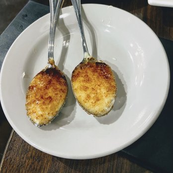 Old Saigon Cafe - Complimentary creme brûlée spoons for dessert. Creamy, fragrant, and delicious. - Vietnamese Near Me - Houston, Texas Old Saigon Cafe - Complimentary creme brûlée spoons for dessert. Creamy, fragrant, and delicious. - Vietnamese Near Me - Houston, Texas
